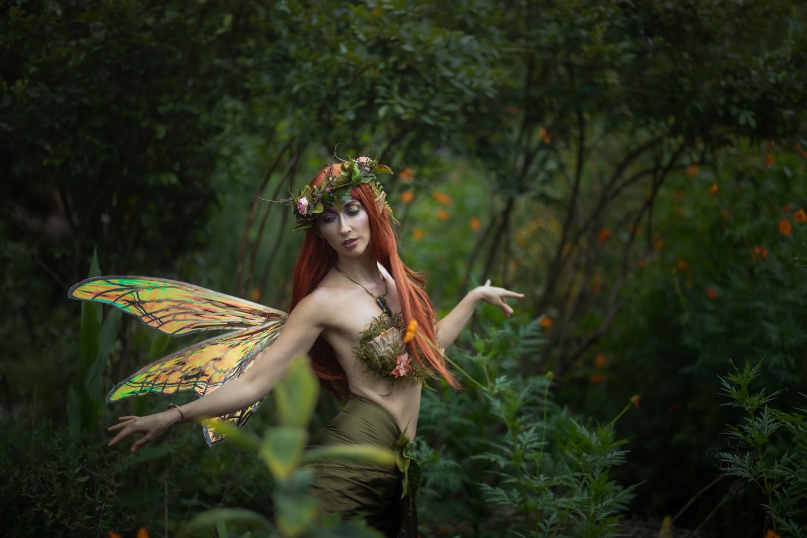 Fantasy fairy character in a dark forest